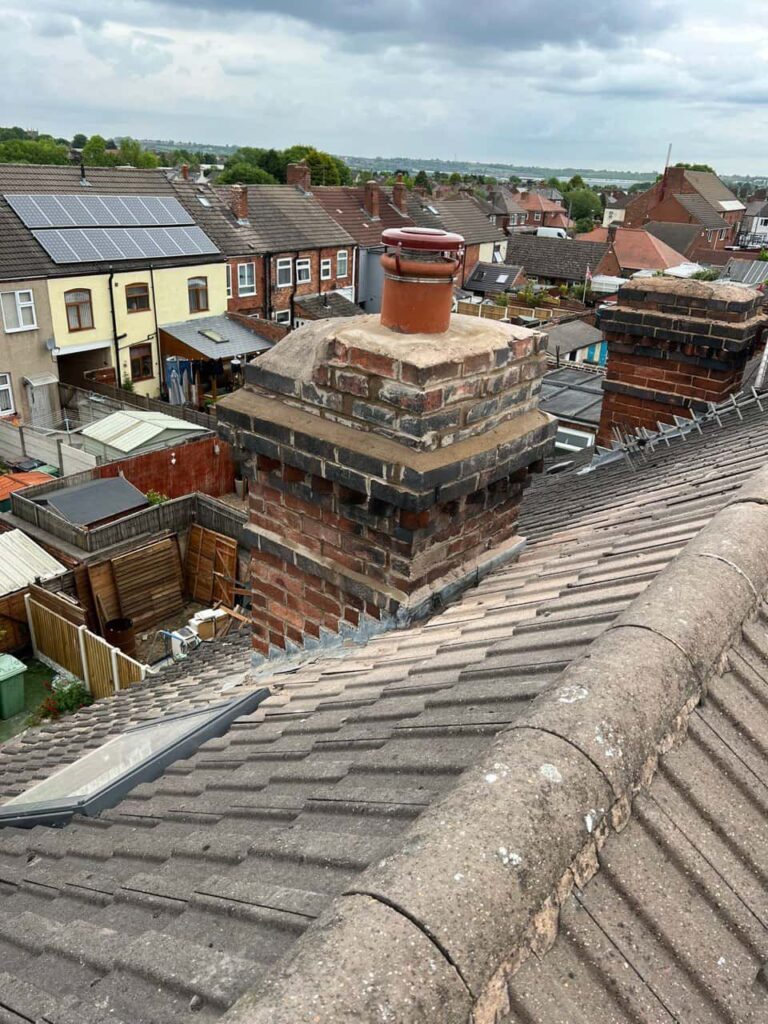 This is a photo taken from a roof which is being repaired by Chislehurst Roofing Repairs, it shows a street of houses, and their roofs